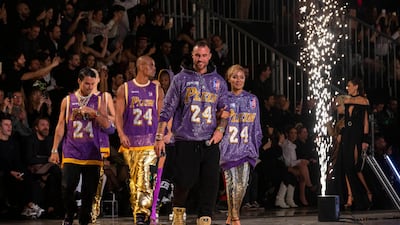 Philipp Plein, centre, at the end of his show during Milan Fashion Week on February 22, 2020. EPA