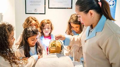 Children can try out different 'careers' at Kidzania - from dentistry to crime scene investigation. Photo: Kidzania