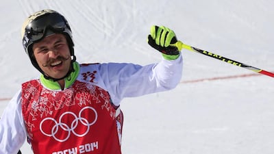 Slovenia's Filip Flisar was the one who negotiated the pack the best to capture gold in the Men's Freestyle Skiing Ski Cross on February 20, 2014. Alexander Klein / AFP