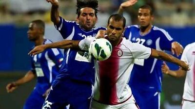 Saeed Al Kathiri, in white, was the hero of the night by scoring twice for Al Wahda against Al Nasr tonight. The Al Nasr players came in for criticism from their coach Walter Zenga for not fighting hard enough. Christopher Pike / The National