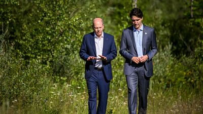 G7 leaders Olaf Scholz and Justin Trudeau talk a walk at Elmau Castle in Bavaria. EPA