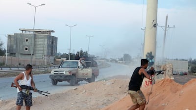 Armed forces allied to internationally recognised government fight with armed group in Tripoli. Reuters