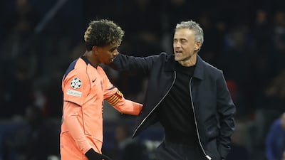 PSG head coach Luis Enrique consoles Lamine Yamal. EPA