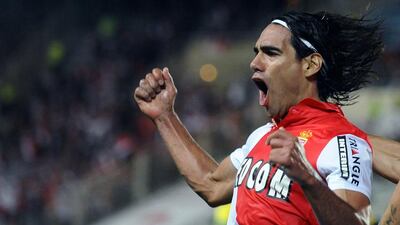 Monaco’s Colombian forward Radamel Falcao celebrates after scoring a goal during the French Ligue 1 match between FC Nantes and Monaco on August 24, 2014, at the La Beaujoire Stadium, in Nantes, western France. Jean-Sebastien Evrard / AFP Photo
