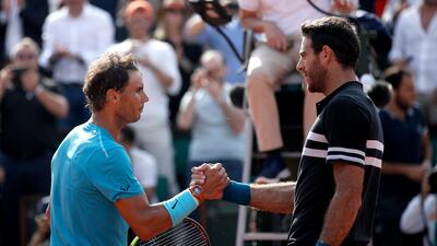 Rafael Nadal, left, dominated during his French Open semi-final win over Juan Martin del Potro on Friday. Yoan Valat / EPA