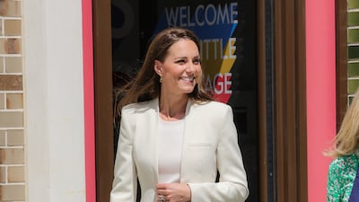 A monochrome high street look, she chose a cream Zara blazer to wear with high-waisted black trousers for a Little Village visit on June 8, 2022. Getty Images