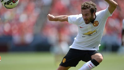 Juan Mata scores against As Roma on Saturday in Manchester United's 3-2 victory in the International Champions Cup. Ron Chenoy / USA Today Sports / July 26, 2014