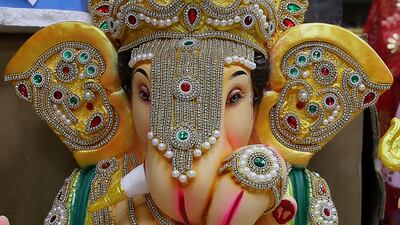 A colourful Ganesh statue made of plaster on display at the Madhoor store in Bur Dubai. The Ganesh festival starts on Saturday. Authorities in the UAE are advising the Indian community to celebrate the festival at home and limit visitors to immediate family members to prevent the spread of the coronavirus. Pawan Singh / The National