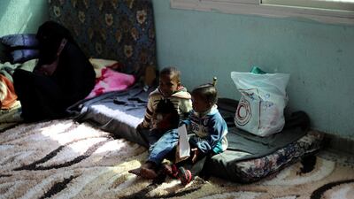 A displaced family, forced to flee their home because of fighting in Tripoli, taking shelter at a school. Ahmed Jadallah / Reuters
