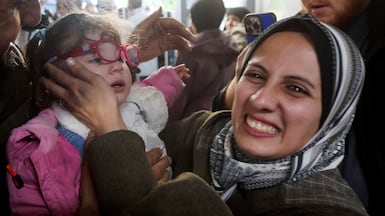 Sundus Al Kurd embraces her daughter Bisan, who returned to Gaza more than two years after being evacuated. Reuters