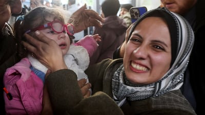 Sundus Al Kurd embraces her daughter Bisan, who returned to Gaza more than two years after being evacuated. Reuters