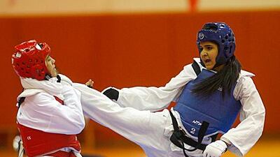 Participants in the Women’s Taekwondo Championship, from the UAE, Oman and Bahrain, noted that the sport is empowering. Mike Young / The National