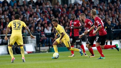 PSG's Neymar, centre, looks forward to his second Ligue 1 match this weekend. Kamil Zihnioglu / AP Photo