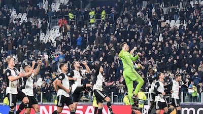 Juventus players celebrate after their victory over Atletico Madrid. AFP