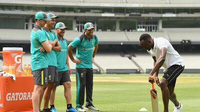 Usain Bolt, right, coaches Australian cricketers Glenn Maxwell, Ashton Agar, Peter Handscomb and Aaron Finch during the Gatorade Fastest Run at the Melbourne Cricket Ground in Australia. Quinn Rooney / Getty Images