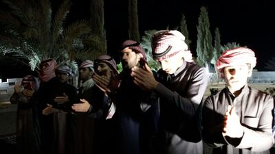 Members of the Al Faqeer tribe engage in an evening dance to farewell their visitors. Suhail Rather / The National
