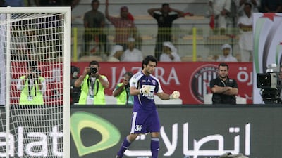 Sulaiman celebrates after helping his side win the penalty shootout. Jaime Puebla / The National