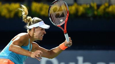 Angelique Kerber of Germany in action against Mona Barthel of Germany on Day 3 of the WTA Dubai Duty Free Tennis Championships at the Dubai Tennis Stadium on February 21, 2017 in Dubai, UAE. Tom Dulat / Getty Images