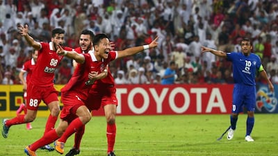 Kwon Kyung-won, third from left, is one of several Al Ahli players who are seemingly fearless on the football pitch. Marwan Naamani / AFP