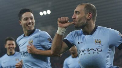 Manchester City's Pablo Zabaleta celebrates his goal with teammate Samir Nasri against Sunderland in the Premier League last Wednesday. Andrew Yates / Reuters / December 3, 2014