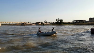 Iraqi rescuers search for survivors. Reuters