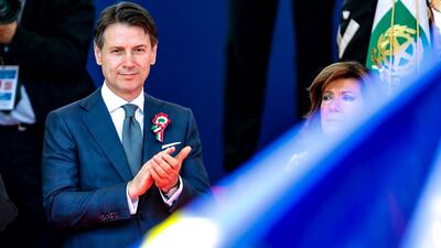 Italian Premier Giuseppe Conte flanked by Senate president Maria Elisabetta Alberti Casellati, attends the celebrations for Italy's Republic Day, in Rome. Giuseppe Lami / ANSA via AP