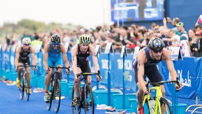 Triathletes take part in the bike leg. Reem Mohammed / The National