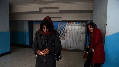 Afghanistan national powerlifting team members leave after a training session.