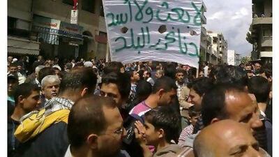 Syrian anti-government protesters rally in Banias last month. A reader condemns Damascus for its violent crackdown on peaceful demonstrations. AFP