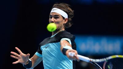 Rafael Nadal returns to Andy Murray. Glyn Kirk / AFP