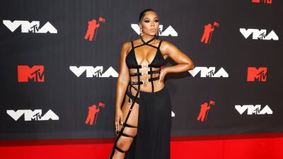 US singer Ashanti, in Michael Costello, arrives on the MTV Video Music Awards red carpet.