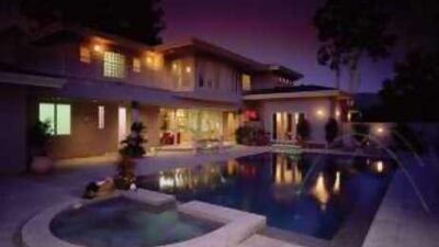 Crystal Fountains' LED-lit water jets criss-cross the pool to add drama at night.