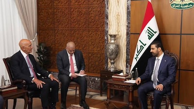 Iraqi Prime Minister Ali Al Zaidi, right, meets Tom Barrack, the US special envoy for Syria and Iraq, left, in Baghdad. Iraq is awaiting US approval for its new envoy to Washington. EPA