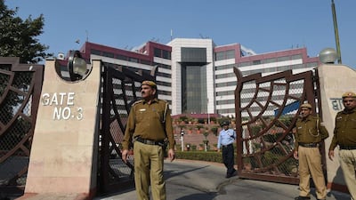 Police stand guard outside the offices of Delhi chief minister Arvind Kejriwal on December 15, 2015. Prakash Singh / AFP