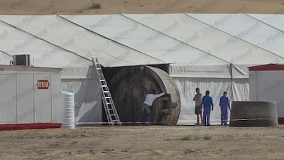 Rolling out the structure for the set. Mona Al Marzooqi / The National