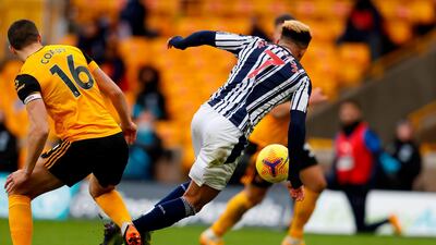 Wolves defender Conor Coady fouls Callum Robinson to give West Brom another penalty