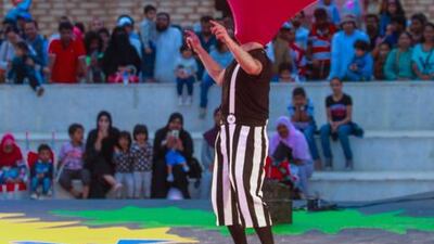 The Dolphin Creative street artist Otto Bas Sotto from Italy does some balloon tricks with the help of a volunteer from the audience. The company brings street performers from across the globe to jobs in the UAE. Victor Besa for The National