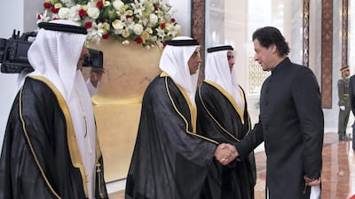 Sheikh Mansour bin Zayed, UAE Deputy Prime Minister and Minister of Presidential Affairs, greets Imran Khan. Seen with Sheikh Hamed bin Zayed, Chairman of the Crown Prince Court of Abu Dhabi and Abu Dhabi Executive Council Member, left, and Sheikh Saif bin Zayed, UAE Deputy Prime Minister and Minister of Interior. Saeed Al Neyadi / Crown Prince Court - Abu Dhabi