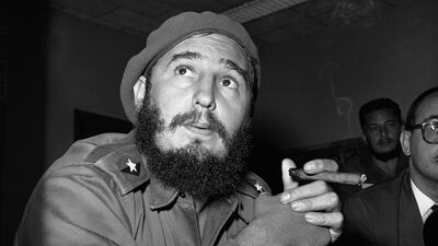 Cuban strongman Fidel Castro enjoys a cigar in 1961. Cuban cigars have been illegal in the US since a trade embargo in 1961. AP Photo
