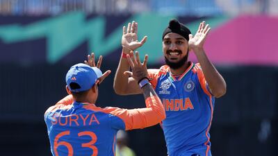 India's Arshdeep Singh, right, celebrates with teammate Suryakumar Yadav after the dismissal of United States' Shayan Jahangir during the ICC Men's T20 World Cup cricket match between United States and India at the Nassau County International Cricket Stadium in Westbury, New York, Wednesday, June 12, 2024. (AP Photo / Adam Hunger)