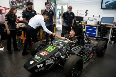 UK Prime Minister Rishi Sunak views the build of an electric racing car at University of Warwick, in Coventry last week. Britain is rejoining the EU’s $100 billion science-sharing programme. AP Photo