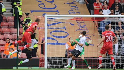 Southampton's Rickie Lambert scores against Manchester United at St Mary's Stadium. Olly Greenwood / AFP