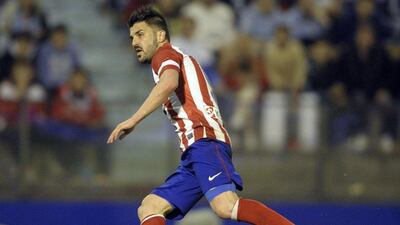 David Villa won the 2013/14 Primera Liga title with Atletico Madrid. Miguel Riopa / AFP