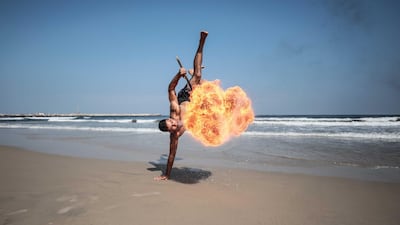 A fire-breathing performance in Gaza. Photo by Majd Mahmoud