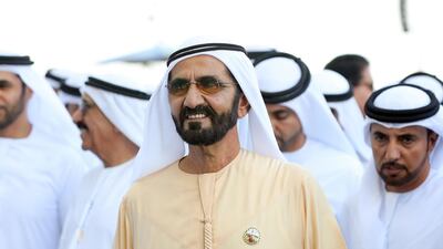 Sheikh Mohammed bin Rashid looks happy as Cross Counter ridden by William Buick wins the Dubai Gold Cup. Chris Whiteoak / The National