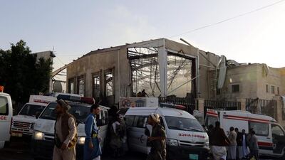 Yemenis inspect the site of Saudi-led airstrikes that hit a funeral ceremony in Sanaa, Yemen, on October 8, 2016. The Saudi-led coalition denied the attack. Yahya Arhab / EPA