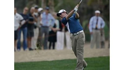 Rory McIlroy was given great support as he tried to catch runaway leader Martin Kaymer yesterday. Jeff Topping / The National