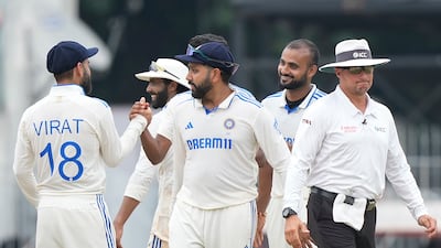 India captain Rohit Sharma, centre, Virat Kohl celebrate after winning the first Test by 280 runs. AP