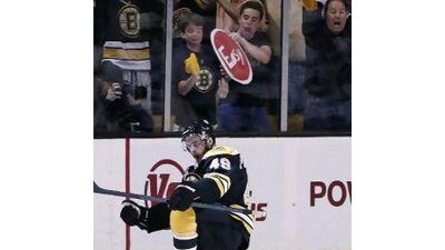 Rich Peverley celebrates with the crowd after the first of his two goals against Vancouver.
