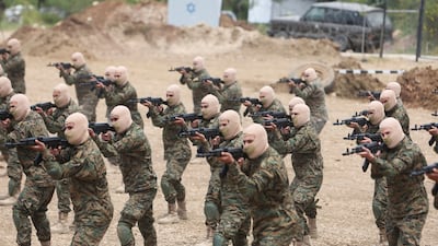 Hezbollah members take part in a military exercise in Aaramta, Lebanon. Reuters